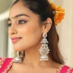 Imperial Multi-Tier Oxidized Silver Jhumka Earrings-Ruby & Green