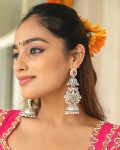 Imperial Multi-Tier Oxidized Silver Jhumka Earrings-Ruby & Green